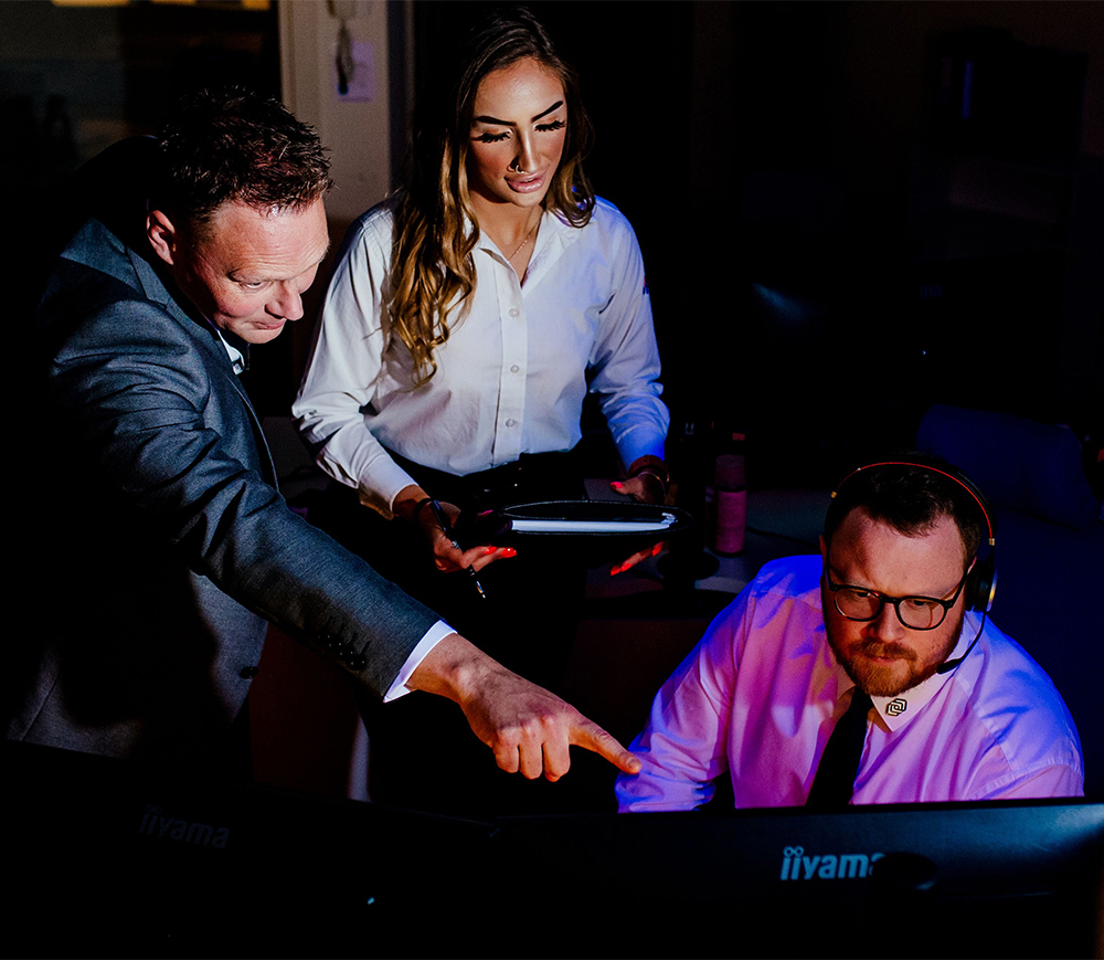 Security monitoring team in control room
